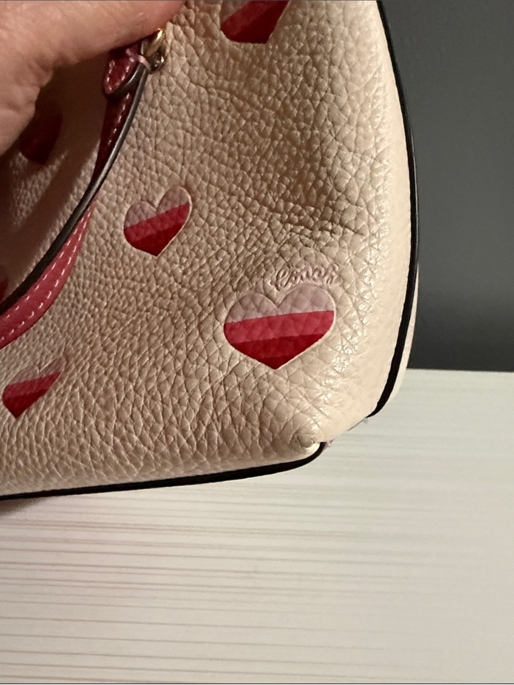 Coach Mini Gallery Crossbody Bag in white with a stripe heart print. - Picture 9 of 11